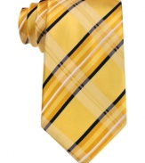 Plaid pops on this Donald J. Trump silk tie designed to leave a lasting impression.