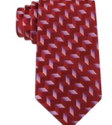 Make strides in sophisticated style with this patterned silk tie from Michael Kors.