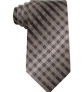 Go off the grid and get out-of-the-box style with this patterned silk tie from DKNY.