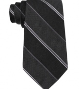 Sport stripes and this DKNY silk tie for instant notice-me style.