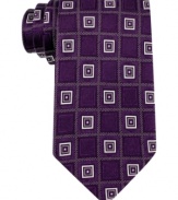 A punchy pattern makes a power statement on this silk tie from Donald J. Trump.