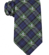 'Tis the season for mixing business and fun-get into the spirit with this plaid and skier-print silk tie from Tommy Hilfiger.