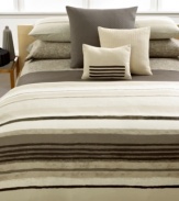 Layer your bed in plush texture with this coverlet from Calvin Klein, boasting a sumptuous quilted pattern in a rich brown solid.