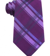 Plaid goes powerful in this statement silk tie from Calvin Klein.