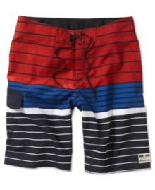 From the company that practically invented board shorts as we know and love them today: Quiksilver trunks in a 2012 pattern of highly irregular lines rendered in sport-friendly, four-way stretch fabric.