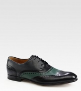 Leather lace-up with brogueings.Leather soleMade in Italy