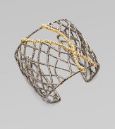 A pretty crystal accented wide cuff with delicate 18k goldplated branches encrusted in pavé Swarovski cystals. Gunmetal-finished brass Length, about 6¼adjustable Width, about 2 Imported 