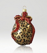 From the Safari collection. This season's new glass ornament collection are mouth blown and decorated in Poland with a wonderful team of old world craftsmen. This one is detailed with crystals, hand applied jewel tone colors and scrolls as if they were a fine piece of jewelry.GlassCrystalMouth blownHand-painted and hand-set3.75H X 2.25W X 1.75DImported