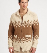 Supreme softness is to be expected when wearing this classic-fit, zip sweater, in a handsome camel hair print that exudes a rustic feel.Two-way zip frontShawl collarWaist patch pocketsRibbed knit cuffs and hemAbout 32 from shoulder to hemCamel hairDry cleanMade in Italy