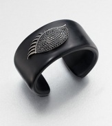 From the Envy Collection. The eye that aodrns this sleek resin cuff is closed in quiet repose, outlined in black rhodium-plated sterling silver, it's lid paved with black cubic zirconia.Black cubic zirconiaRhodium-plated sterling silverResinDiameter, about 2.25Imported