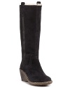 A sturdy wedge updates the classic shearling UGG® Australia boot. By UGG® Australia.