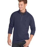 Layer on the polish with the sleek, ribbed design of this zippered mock-neck sweater from Izod. (Clearance)