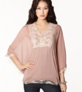 Floaty and feminine, this oversized Bar III chiffon top features lace & beading for a girly-vintage vibe!