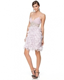 Sweet but not so innocent, this softly petaled dress is a statement in pure femininity. Pleated v-neckline stops at an inset empire waist bedazzled with tonal beads and sequins. Petal skirt ends with a bouncy bubble hem. With adjustable, lingerie straps and built-in bra padded lining. Invisible side zip with hook/eye closure.