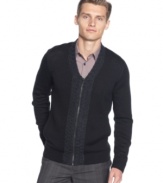 Suave and elegant. Look dashing in this fitted merino wool v-neck cardigan by Calvin Klein.