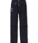 Sporty track pants by GUESS Kids get a stylish accent with logo details and a drawstring waist.