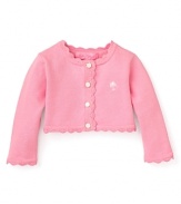 A cute button-front cardigan from Lilly Pulitzer with sweet scalloped trim.