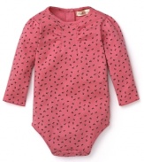 A must-have Pearls & Popcorn bodysuit is rendered in super soft floral print cotton with delicate gathering details.