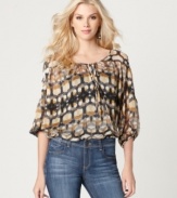 A little bit boho with a cool geometric print, this blouse by Kut from the Kloth is an instant classic!