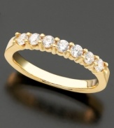 Timeless sparkle and classic design. This ring features seven round-cut diamonds (1/2 ct. t.w.) set in 14k gold.