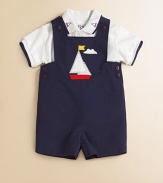 Set sail on this sporty shortall with button shoulders and waist, plus a handsome boat appliqué.SquareneckSleevelessButton shouldersBottom snapsWaistband buttonsCotton/polyesterMachine washImported Please note: Number of buttons/snaps may vary depending on size ordered. 