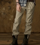 A crisp cotton twill chino pant earns its rank as a go-to favorite with subtle vintage fraying and a slim fit.