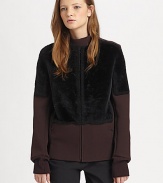 Ultra-soft shearling panels elevate this modern zip-front topper.Band collarShearling front panelFront zipZipper pocketsRib-knit cuffsRib-knit back hemlineFully linedAbout 25 from shoulder to hemWoolDry cleanImportedFur origin: SpainModel shown is 5'10 (177cm) wearing US size 4. 