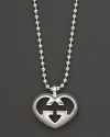 From the Love Britt collection, a sterling silver bead necklace with heart pendant. Designed by Gucci.