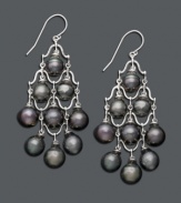 Nothing says elegance like pearls. Pretty cultured Tahitian pearls (7-8 mm) combine with sterling silver to create a polished pair of chandelier earrings, perfect for day or night. Approximate drop: 2-1/2 inches.