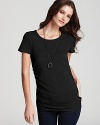 Ruched sides shape the flattering, fitted silhouette of a scoop neck tee, designed in lightweight cotton.