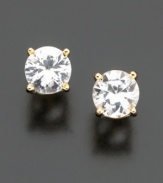 Look (and feel!) like a million dollars. These classic stud earrings feature round-cut white sapphires (2 ct. t.w.) set in 14k gold.