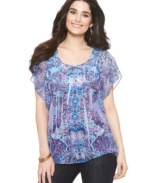 A flowing, sheer top from One World adds a touch of exotic glamour to any outfit!