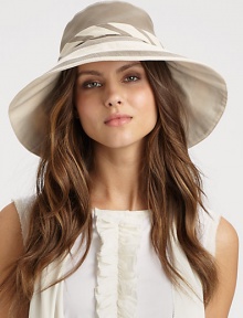 This colorblocked, yet neutral design features an external, adjustable tie and removable inner band. CottonBrim, about 4¼Removable inner bandCotton linedHand washImported 