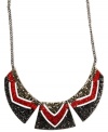 Haute under the collar. This statement necklace from Givenchy is crafted from hematite-tone mixed metal with multicolor crystal patterns providing a glamorous touch. Daring to be different Approximate length: 16 inches + 2-inch extender.