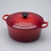 Le Creuset 2.75-qt. round French oven. This enameled cast iron casserole goes easily from oven or stovetop to the table. Ideal for cooking and re-heating risotto, soups, stew, and for simmering or slow-cooking foods. Secure lid seals in moisture and flavor. Retains heat well and is beautiful enough for tabletop serving. Features sturdy, cast handles and is oven-safe to 450 degrees.