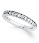 Celebrate the passage of each loving year. This stunning Hearts and Arrows anniversary band features round, brilliant-cut diamonds (1/2 ct. t.w.) set in 14k white gold.