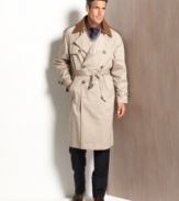 A trench coat classic enough to conjure images of foreign correspondents in Forties films: The belted and double-breasted Edmond from Lauren by Ralph Lauren, in waterproof cotton-blend twill.