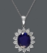 True glamour. Effy Collection's royalty-inspired style highlights a stunning oval-cut sapphire (4-1/3 ct. t.w.) surrounded by round-cut diamonds (1 ct. t.w.). Setting and chain crafted in 14k white gold. Approximate length: 18 inches. Approximate drop length: 1 inch. Approximate drop width: 2/3 inch.