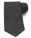 A neat and fancy gancini pattern, on a classic Salvatore Ferragamo silk tie.