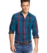 A bold plaid print gives this INC International Concepts button down shirt a contemporary edge.