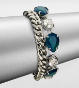 From the Black Tie Optional Collection. A chunky curb chain is joined by a row of emerald green and clear faceted stones in this fun design, the two strands creating a quirky complement to one another.Glass and plasticSilvertoneLength, about 8Ring claspImported