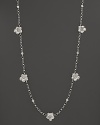 Delicate gardenias, captured at the height of their beauty in sterling silver, bloom on this necklace from Buccellati.