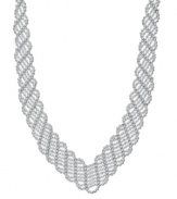 Spark up a conversation with this head-turning statement piece. Crafted in sterling silver, this intricately woven necklace by Giani Bernini looks gives the appearance of delicate lace. Approximate length: 15-3/4 inches + 1/2-inch extender.