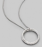 From the Silver Ice Crossover Collection. Two intertwining rings, one of sterling silver cable, the other of white gold set with pavé diamonds, hanging elegantly from a sterling silver box chain. Diamonds, 0.39 tcw Chain length, about 16 Pendant diameter, about 1 Lobster clasp Made in USA