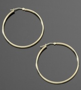 These delicate hoop earrings are the perfect compliment to your dressed-up style or everyday look. Crafted in 14k gold. Approximate diameter: 3/8 inch.