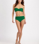 A high-waist design that offers style options. It can be worn under the navel or sit low on hips. Side ruching offers a flattering silhouette.Stretch comfortHigh-waist can also be folded under navel or worn low on hipFull coverageFully lined84% polyamide/16% elastaneHand washImported Please note: Bikini top sold separately. 