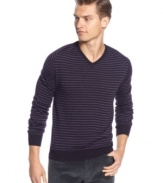 Thin stripes add some refinement to this v-neck sweater from Calvin Klein. You'll be ready for your evening out in style.