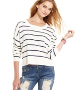 Who doesn't love a good slouchy sweater? Every girl needs one! This cute Tommy Girl sweater combines comfort and style with its oversized fit and preppy stripes.