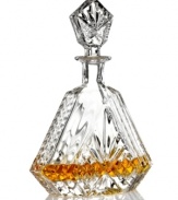 The sparkling sophistication of yesteryear makes a chic comeback with this triangular wine decanter, featuring the intricate starburst pattern of Godinger's popular Dublin crystal serveware collection.