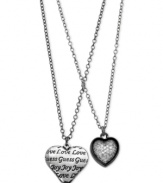 Hearts in the right place. This two-row necklace from GUESS is crafted from hematite-tone mixed metal with hematite-tone and glass crystal hearts giving you more to love. Item comes packaged in a signature GUESS Gift Box. Approximate length: 15 inches + 2-inch extender. Approximate drop: 1-1/4 inches.